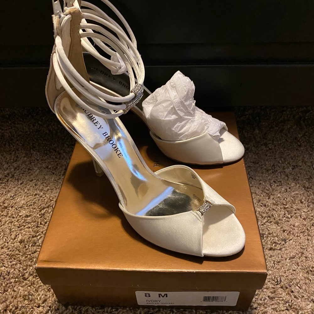 Audrey Brooke white heels